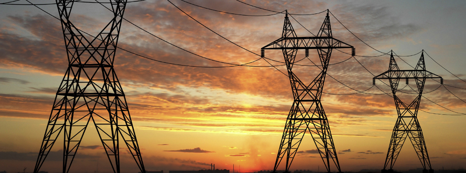 Electric powerlines over sunrise